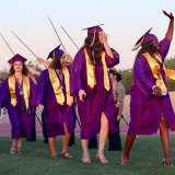 2019 grads walk into Tiger Stadium